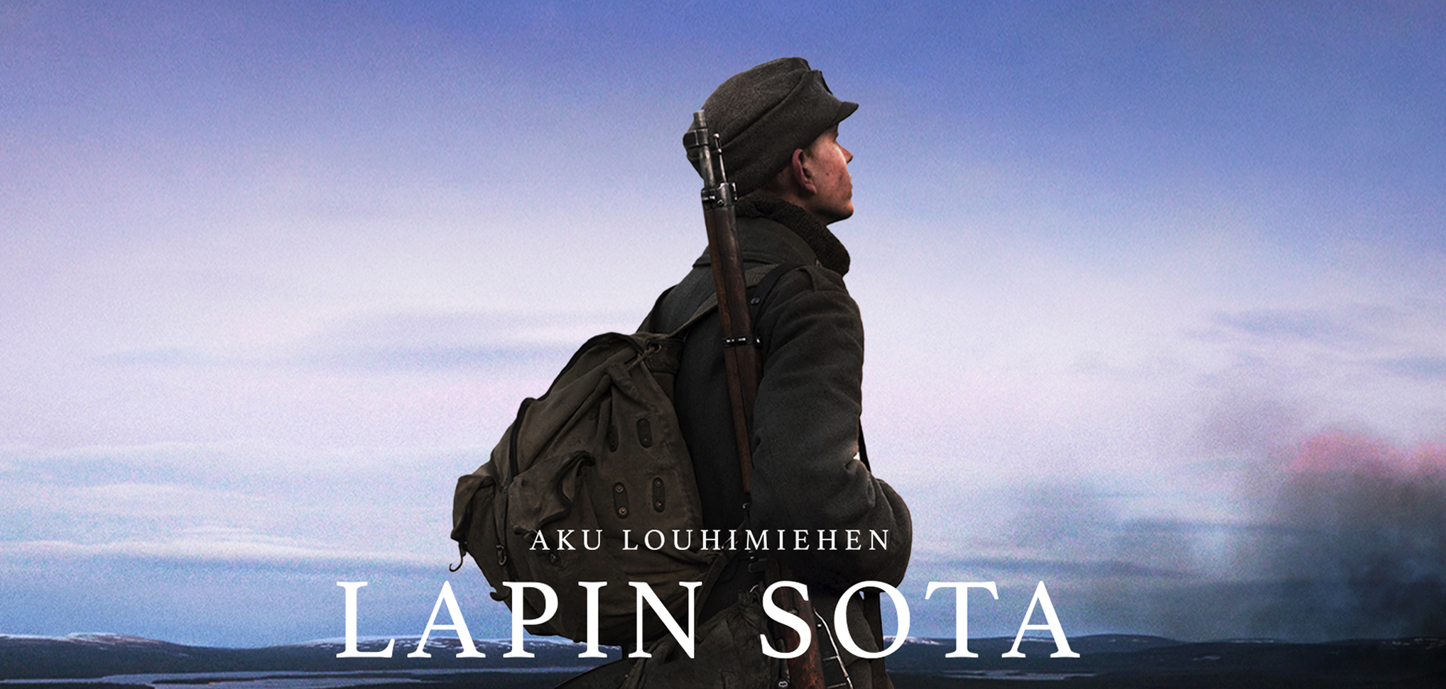 Kuvassa Lapin sota -elokuvan mainos, jossa seisoo ihminen reppu selässä.